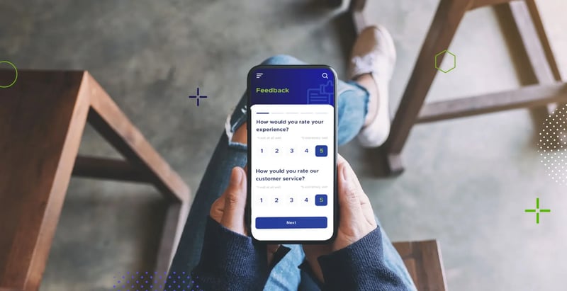 Picture of a person holding a smartphone with a feedback form