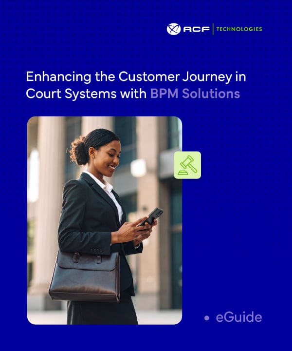 Professional woman smiling while checking her phone outside a courthouse, illustrating ACF Technologies’ eGuide on enhancing the customer journey in court systems with BPM solutions.