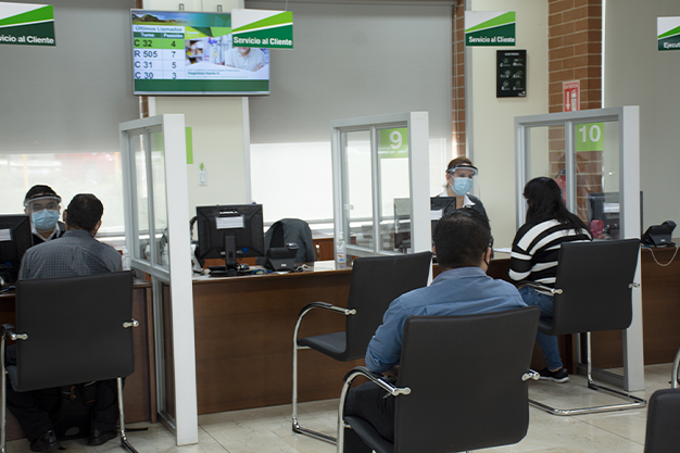 Promerica Bank digital queue display screens and ticketing system powered by ACF Technologies Q-Flow.