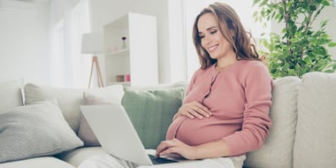 Pregnant woman using virtual services. 