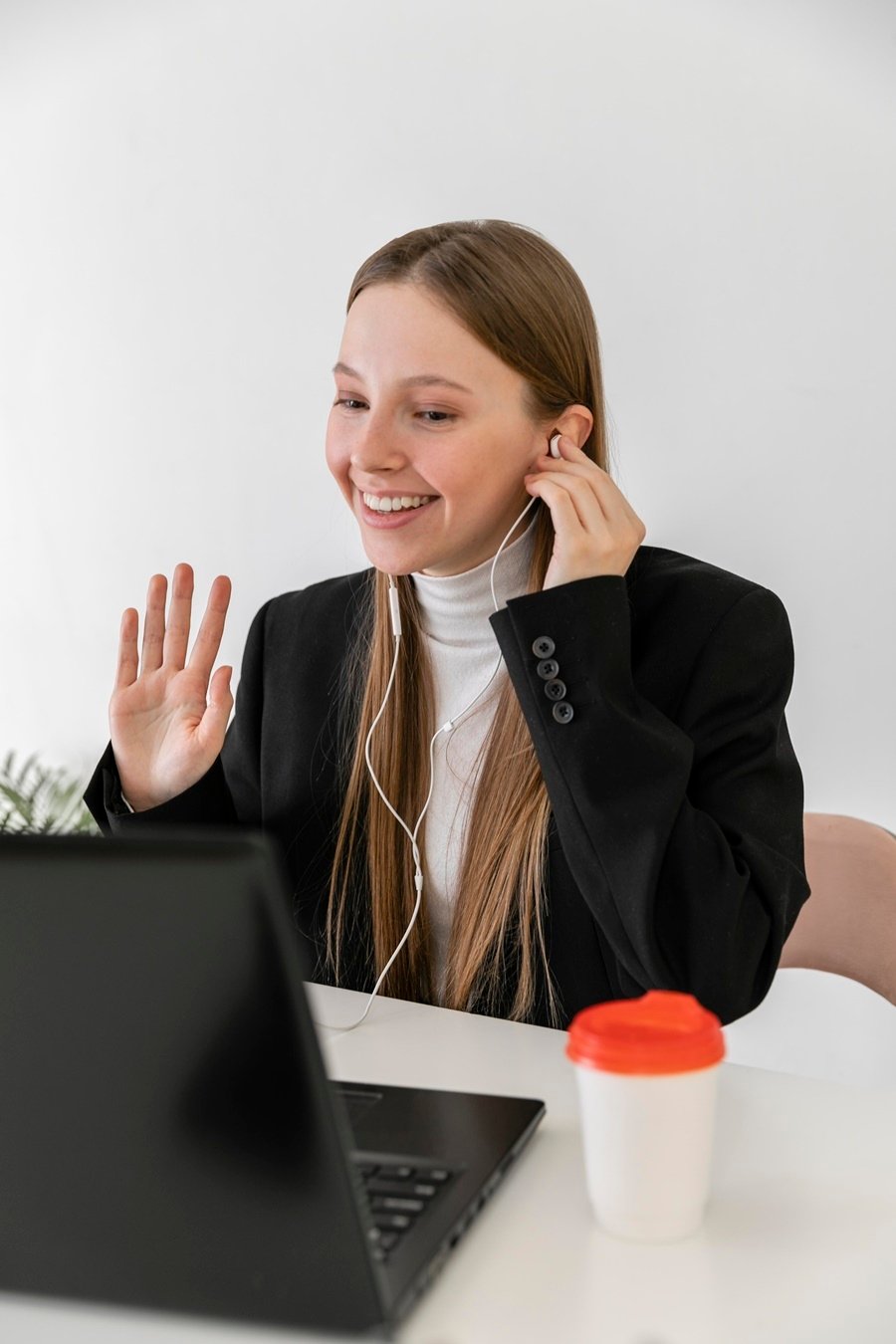 medium-shot-woman-working-with-earphones