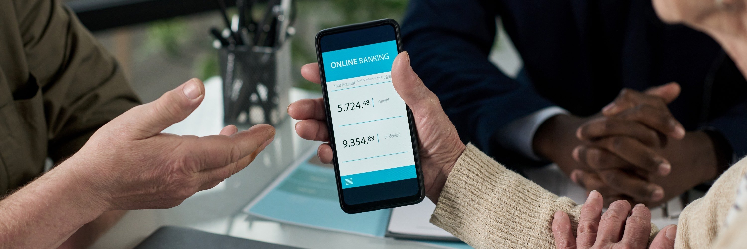 senior-woman-using-banking-app-2025-08-03-20-02-48-utc (1)