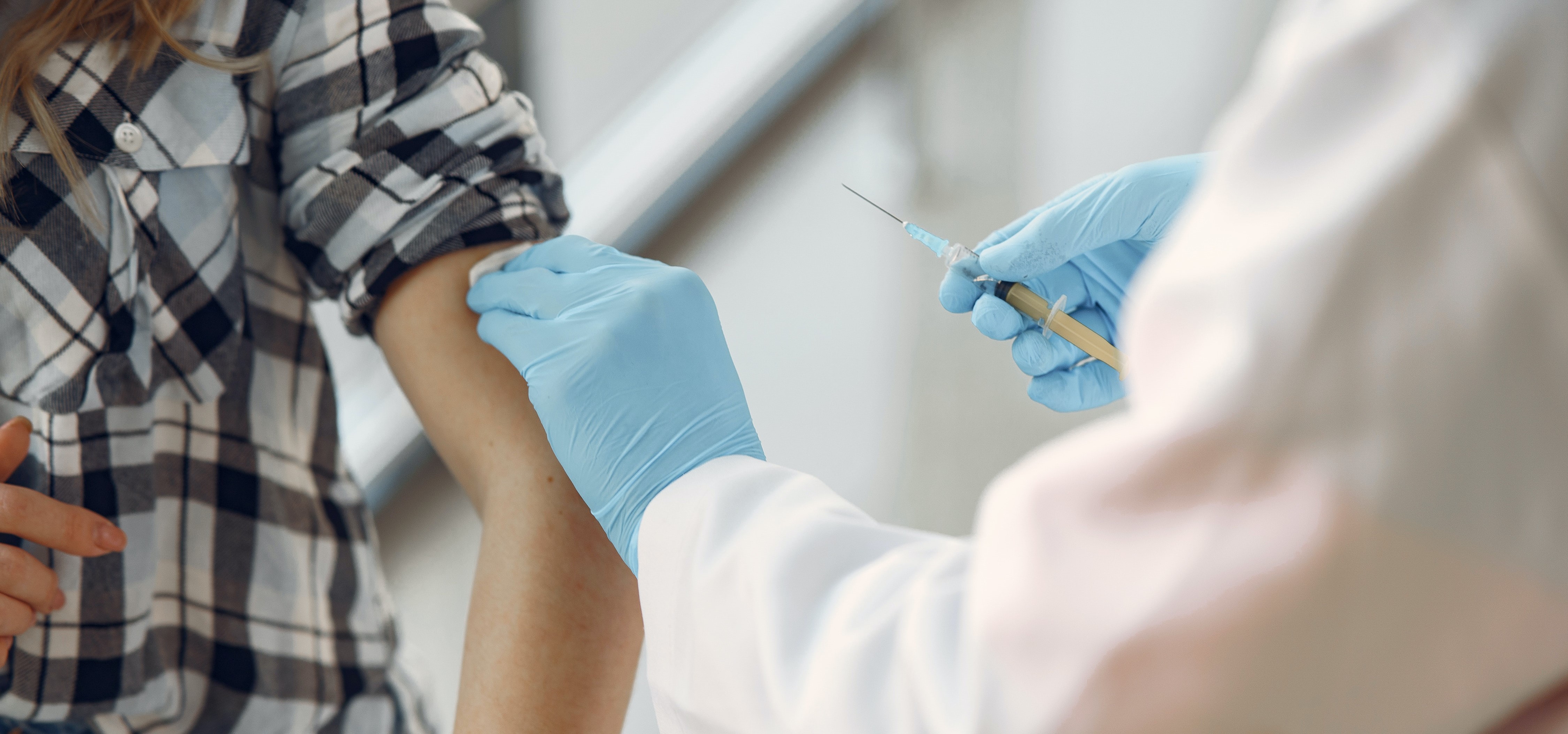 Person receiving vaccination